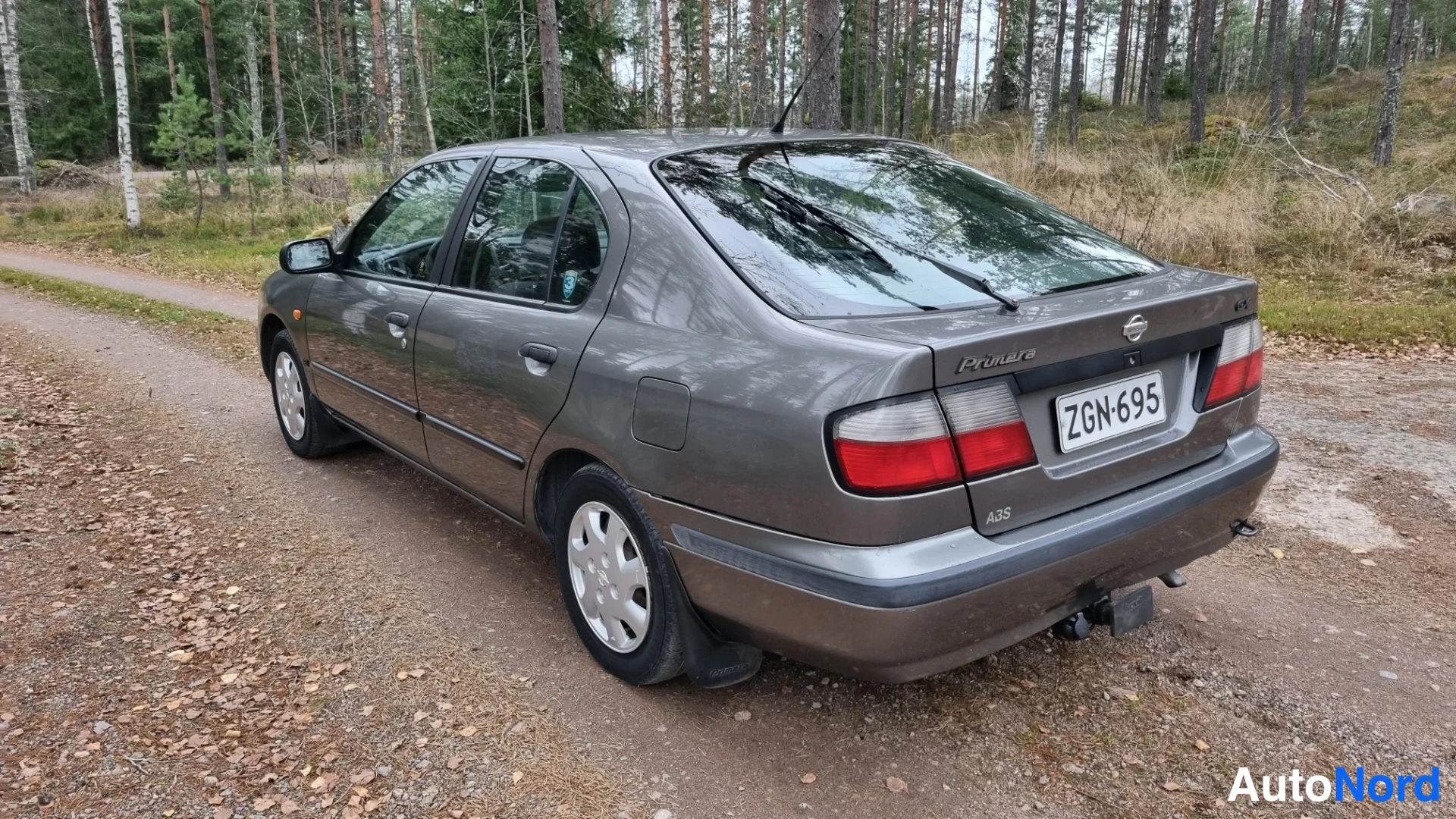 Grey Nissan Primera 1997, rear three-quarter, photo 5