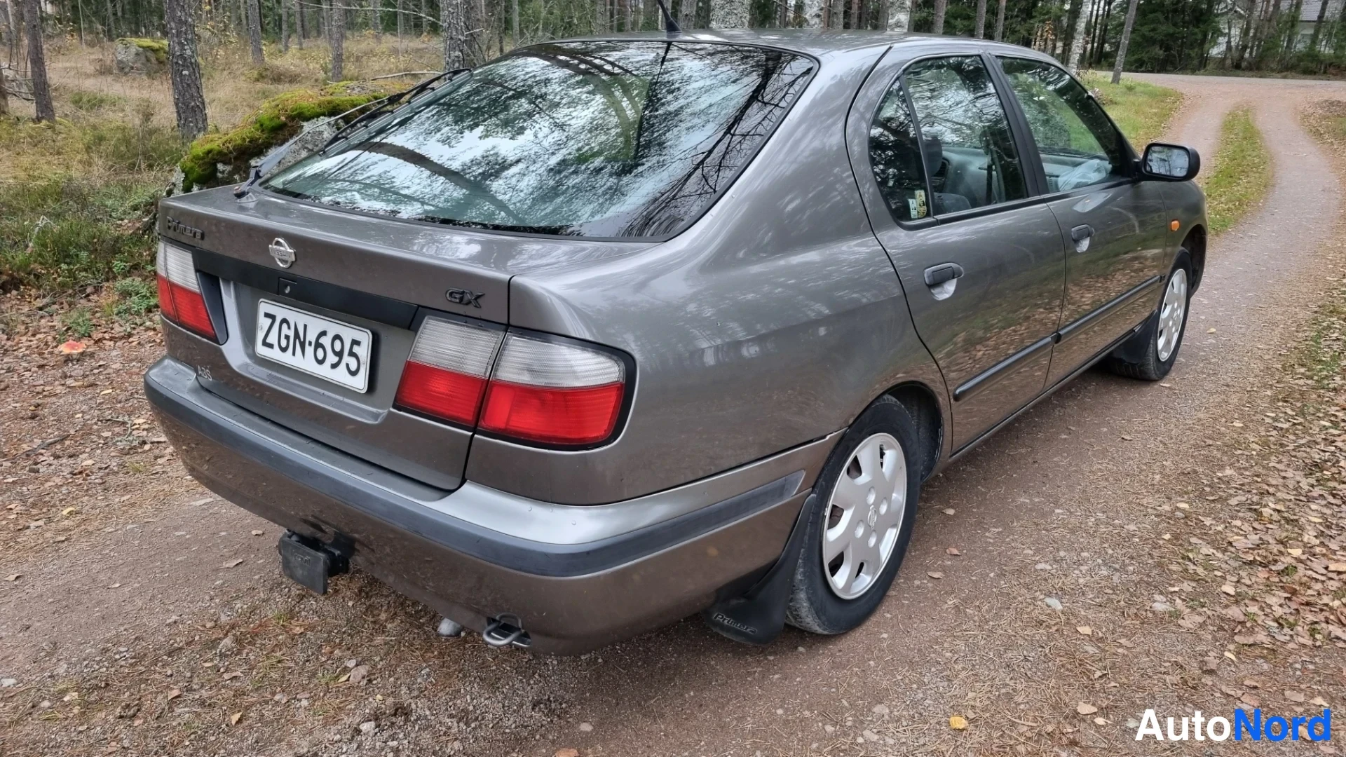 Grey Nissan Primera 1997, rear three-quarter, photo 6