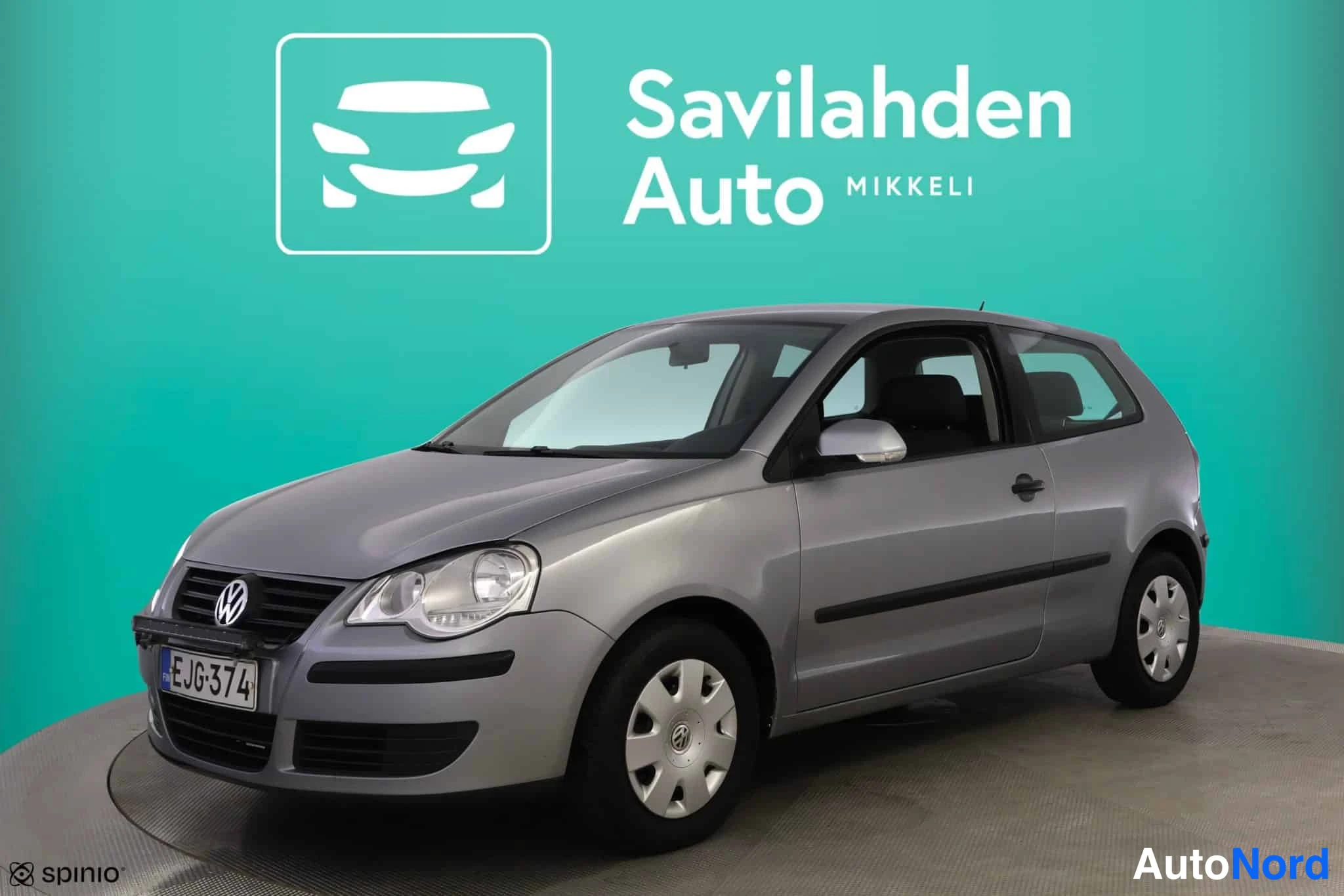 Silver Volkswagen Polo 2007, snett framifrån, fronten åt vänster, bild 2