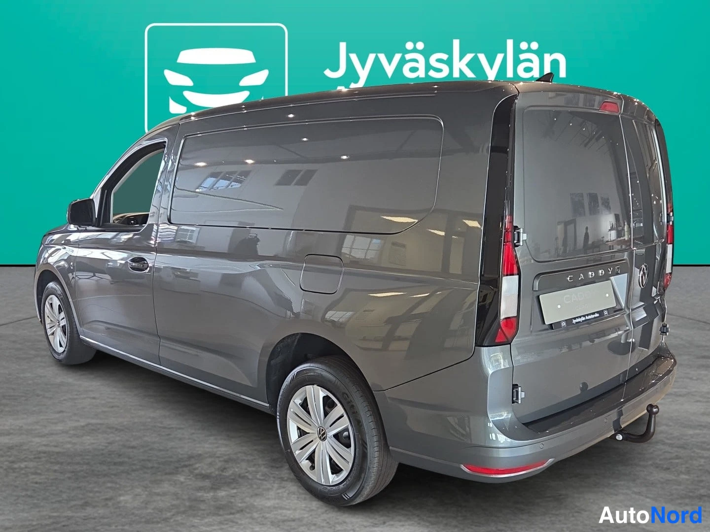 Harmaa Volkswagen Caddy 2026, takaviisto, kuva 4