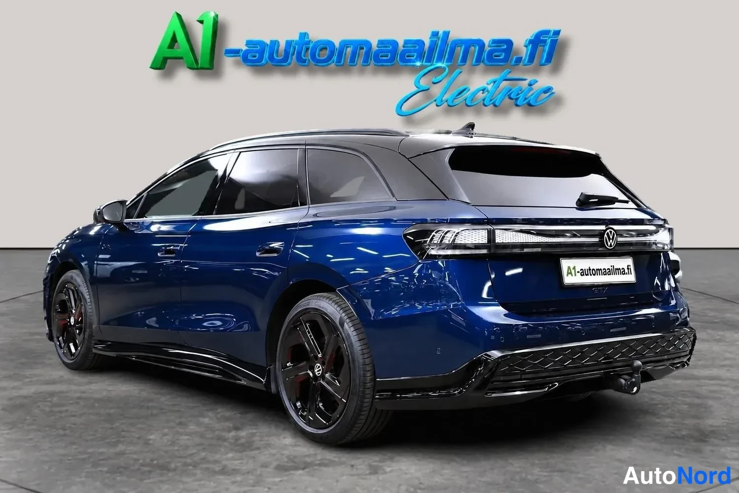 Sininen Volkswagen ID.7 Tourer GTX 2025, takaviisto, kuva 5