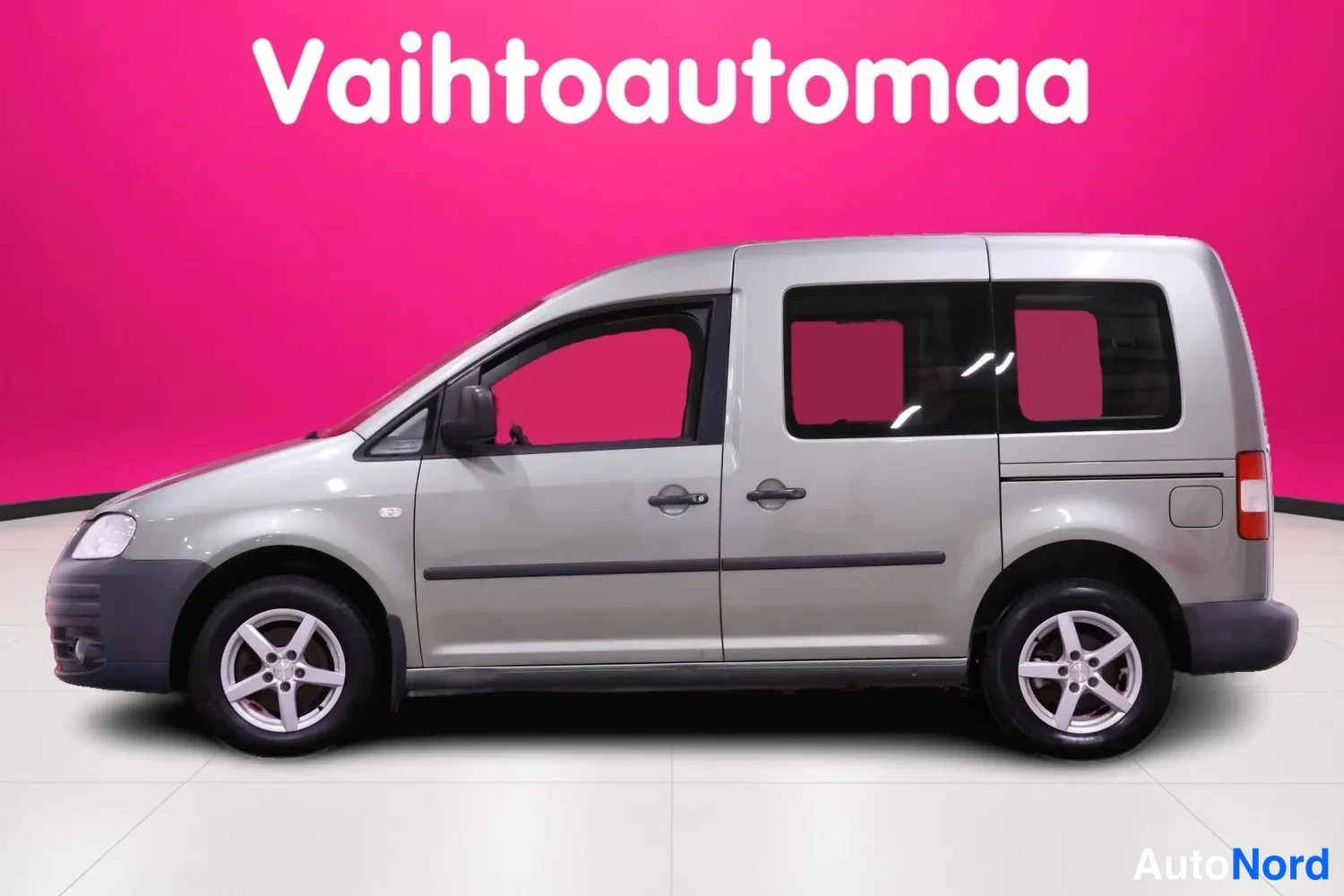Vihreä Volkswagen Caddy Life 2008, sivulta, kuva 3