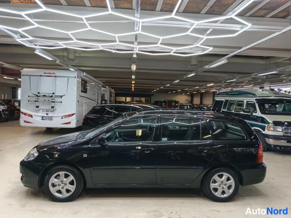 Black Toyota Corolla 2006, side, photo 6