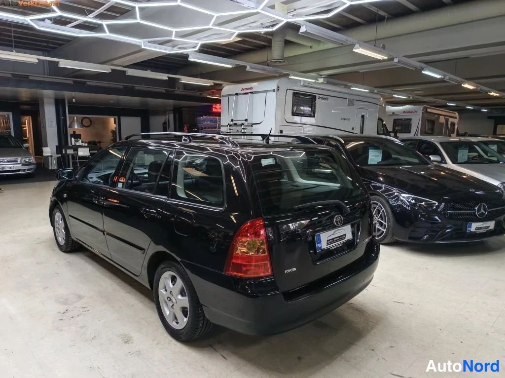 Black Toyota Corolla 2006, rear three-quarter, photo 7