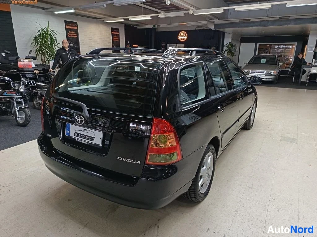Black Toyota Corolla 2006, rear three-quarter, photo 8