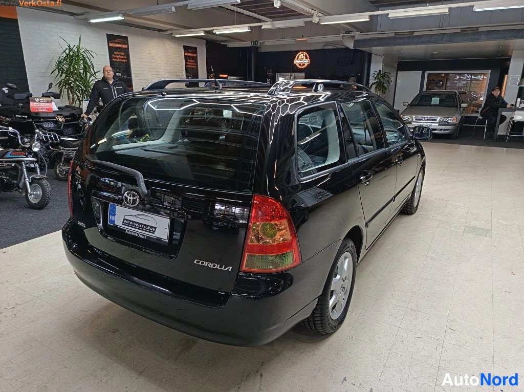 Black Toyota Corolla 2006, rear three-quarter, photo 7