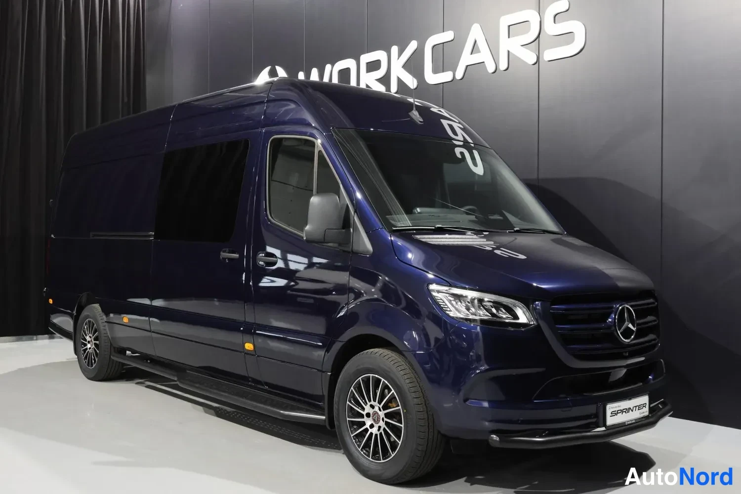 Blue Mercedes-Benz Sprinter 2026, front three-quarter, nose to the right, photo 2
