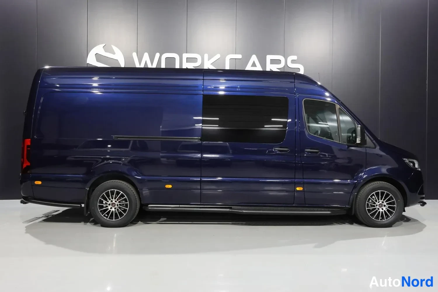 Blue Mercedes-Benz Sprinter 2026, front three-quarter, nose to the right, photo 3