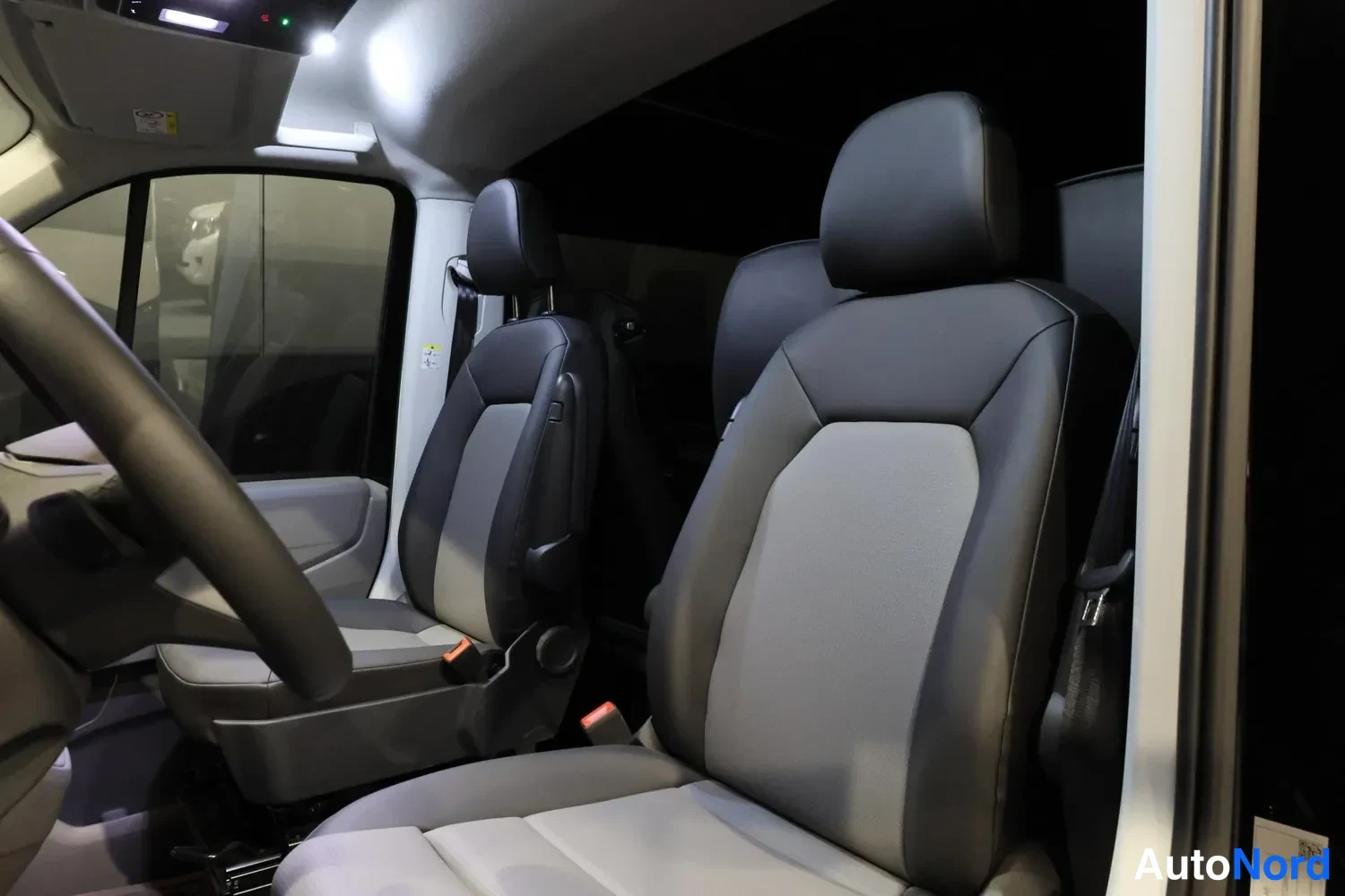 Black MAN TGE 2026, front seats, photo 12