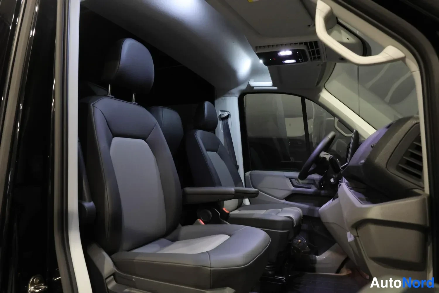 Black MAN TGE 2026, front seats, photo 14
