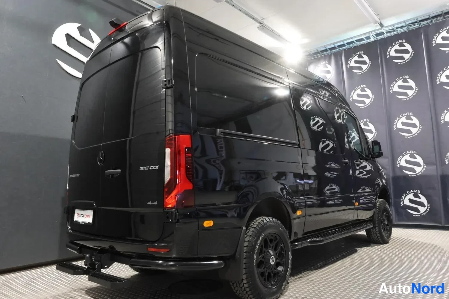 Black Mercedes-Benz Sprinter 319 CDI 2026, rear three-quarter, photo 5