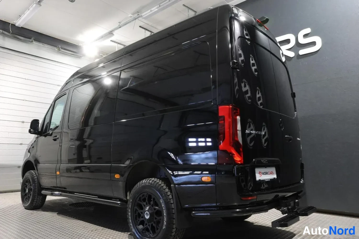 Black Mercedes-Benz Sprinter 319 CDI 2026, rear three-quarter, photo 6