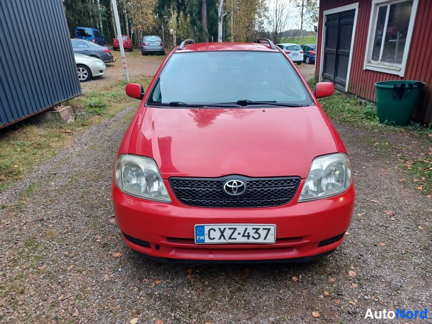 Punainen Toyota Corolla 2004, edestä, kuva 4