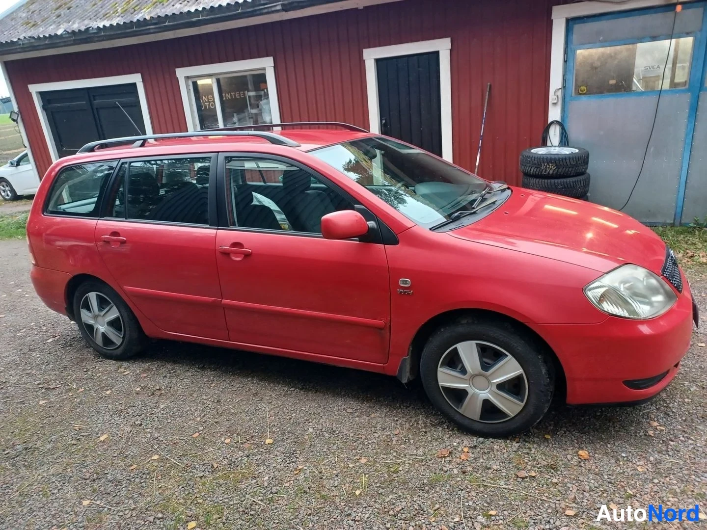 Punainen Toyota Corolla 2004, takaviisto, kuva 6