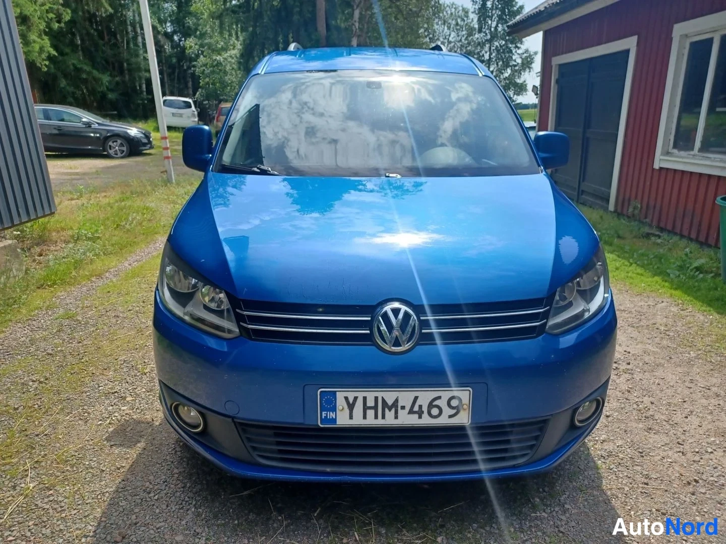 Sininen Volkswagen Caddy 2011, edestä, kuva 6