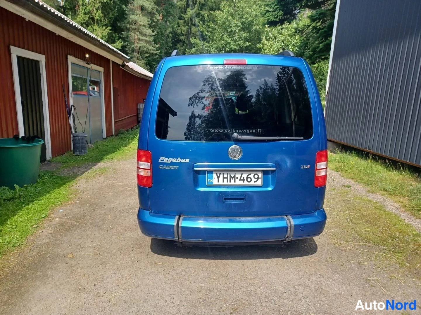 Sininen Volkswagen Caddy 2011, takaa, kuva 10