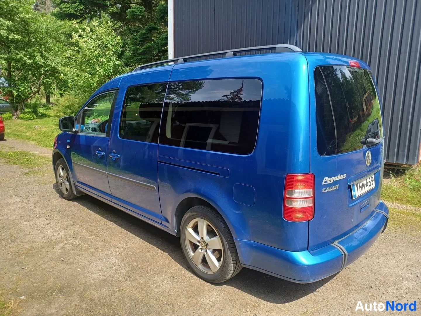 Sininen Volkswagen Caddy 2011, takaviisto, kuva 7