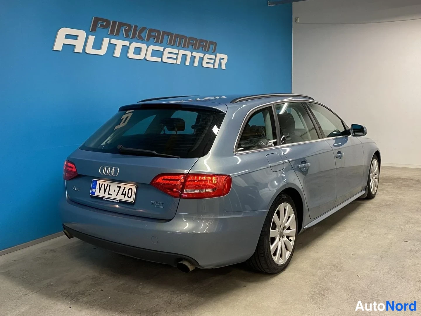Sininen Audi A4 Avant 2010, takaviisto, kuva 6