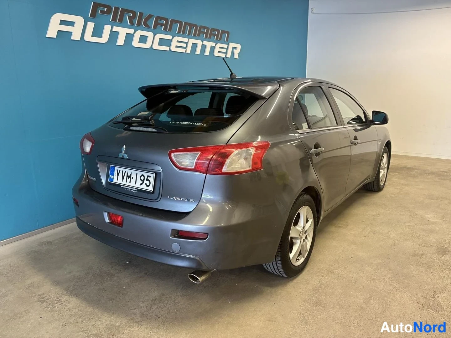 Harmaa Mitsubishi Lancer 2009, takaviisto, kuva 5
