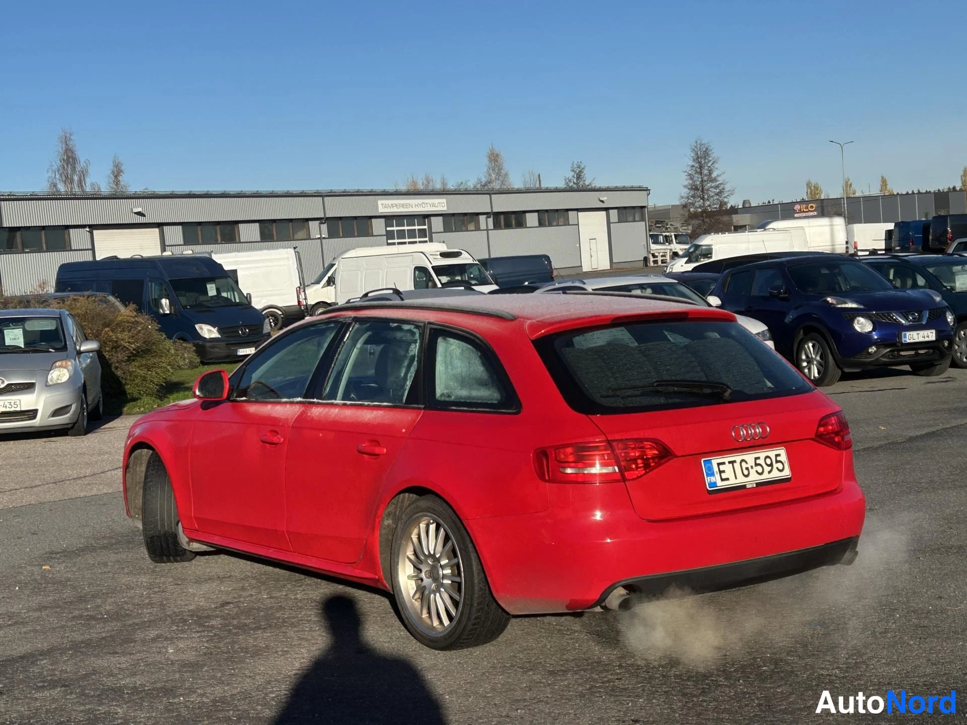 Punainen Audi A4 Avant 2009, takaviisto, kuva 2