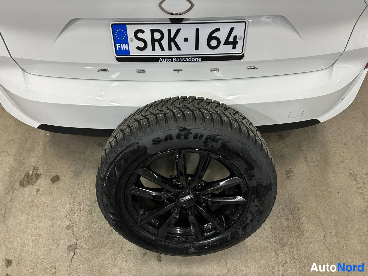 Vit Opel Astra Sports Tourer 2024, bakifrån, bild 9