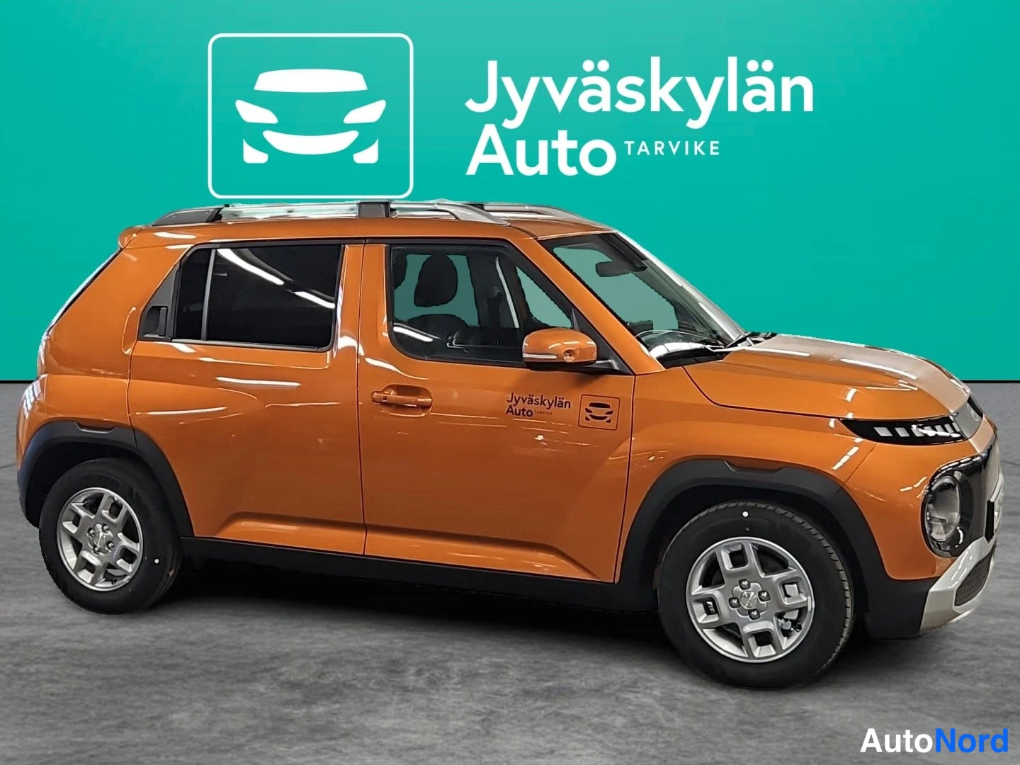 Oranssi Hyundai Inster 2026, etuviisto, keula oikealle, kuva 4