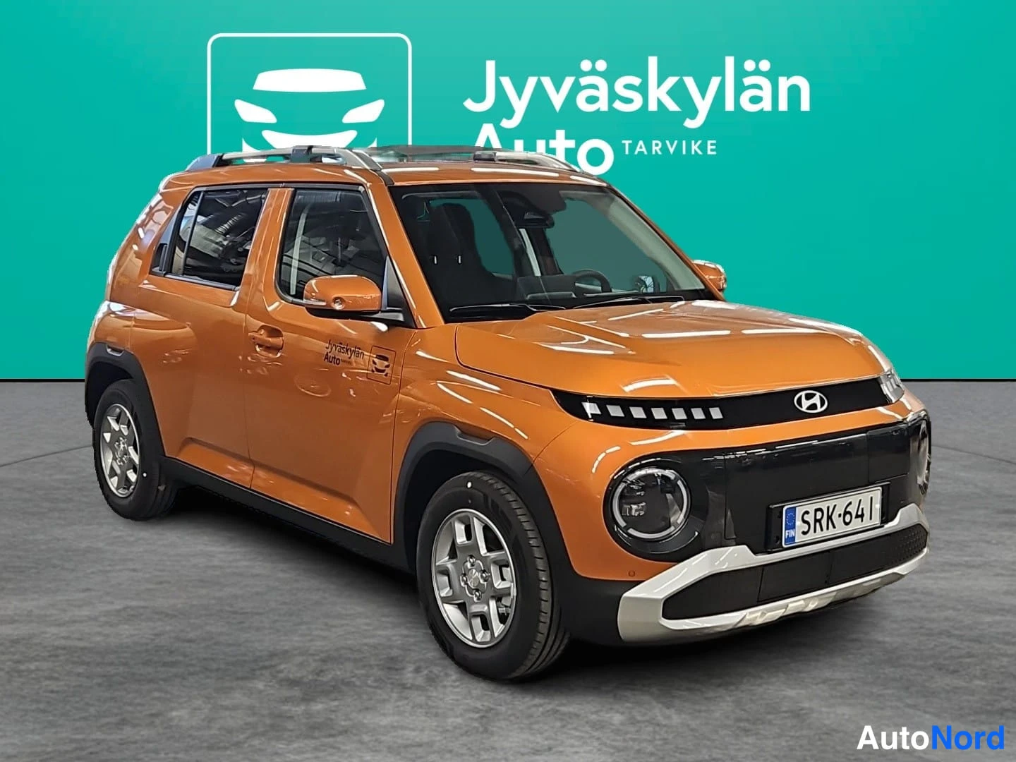 Oranssi Hyundai Inster 2026, etuviisto, keula oikealle, kuva 3