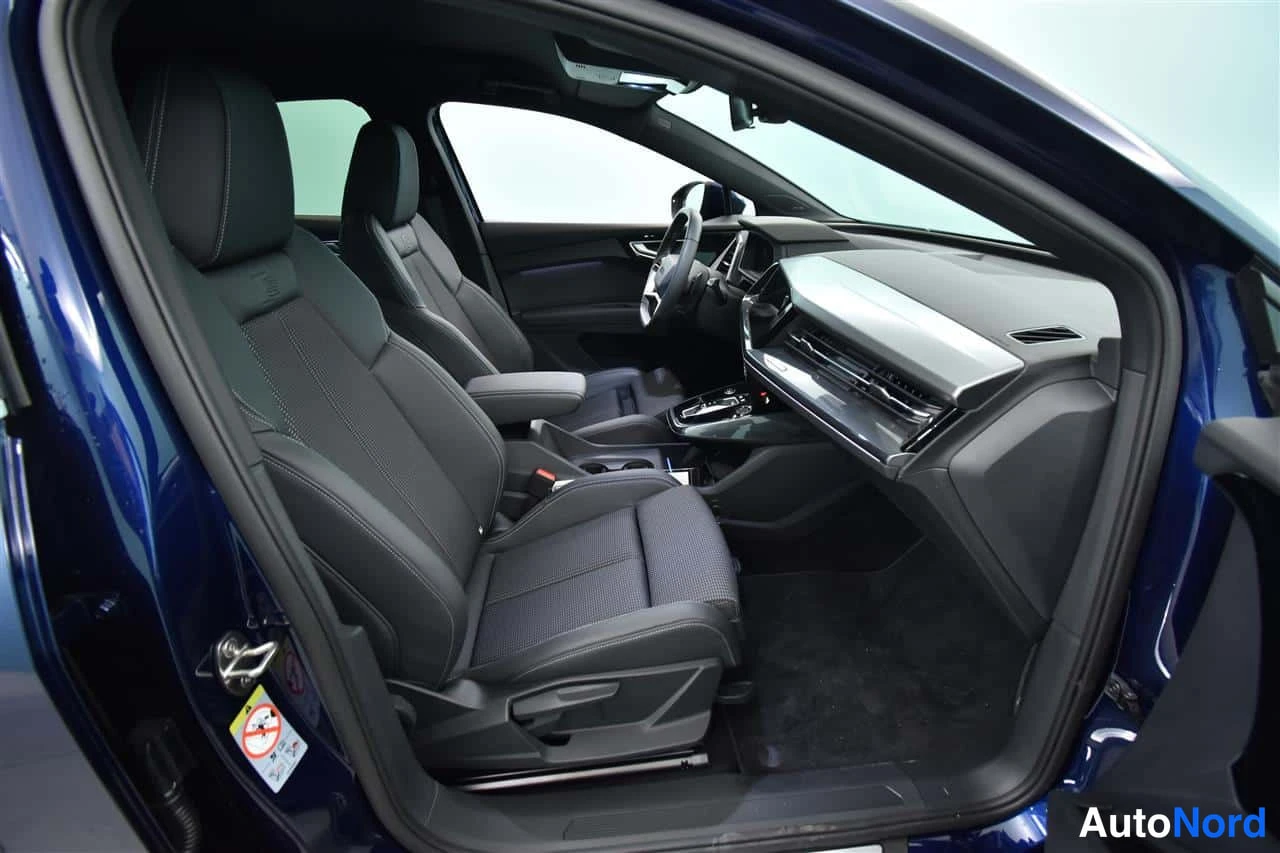Sininen Audi Q4 e-tron 2024, etuistuimet, kuva 19