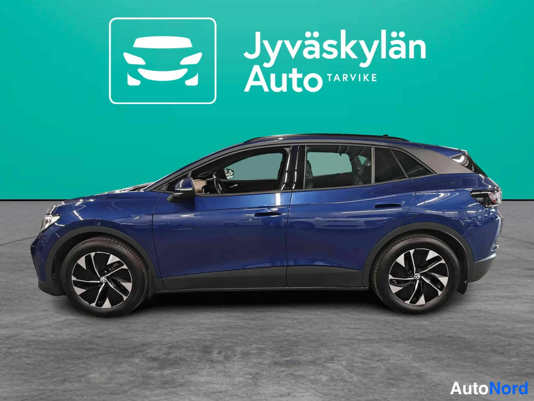 Sininen Volkswagen ID.4 2025, sivulta, kuva 9