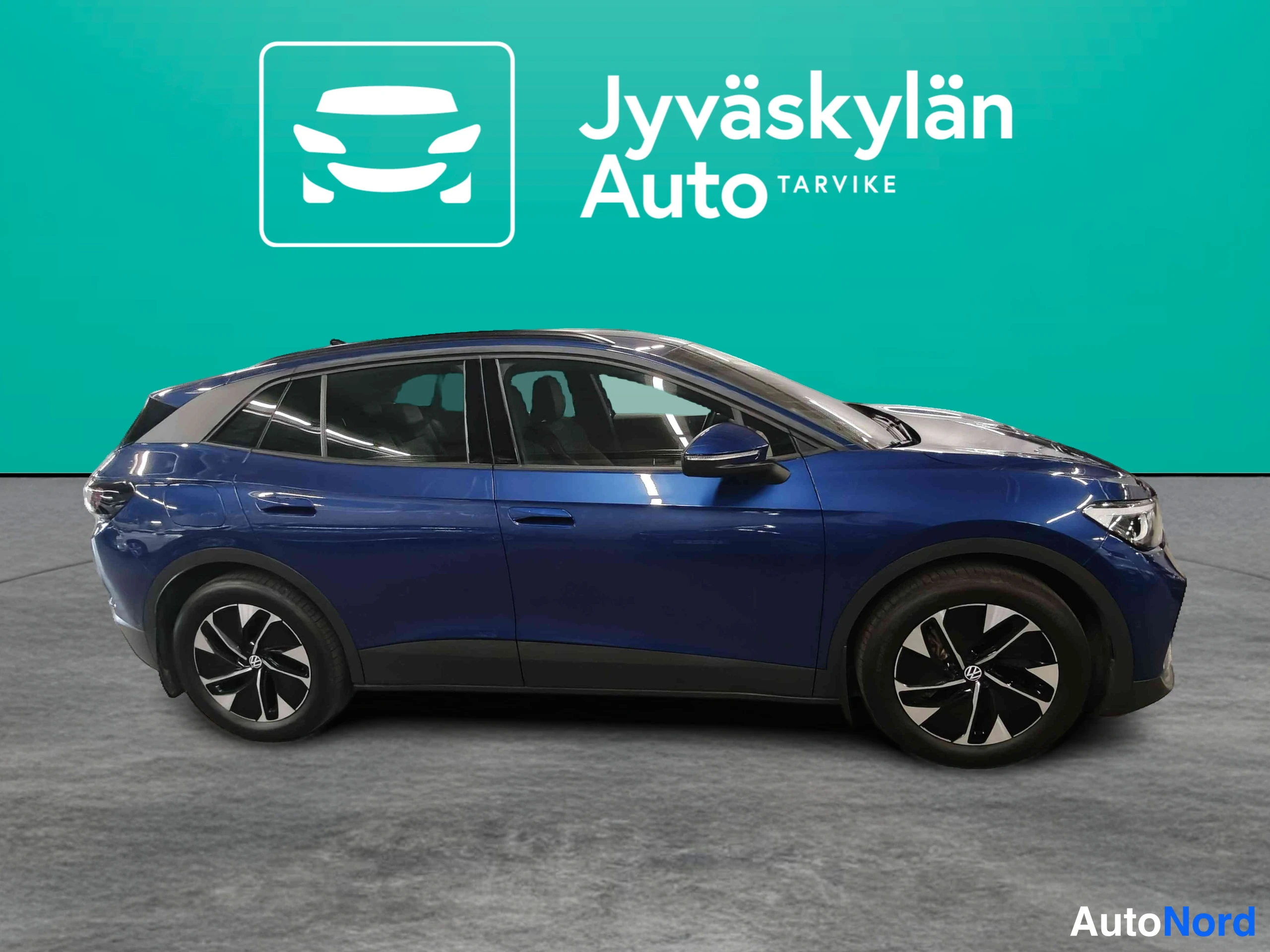 Sininen Volkswagen ID.4 2025, sivulta, kuva 8