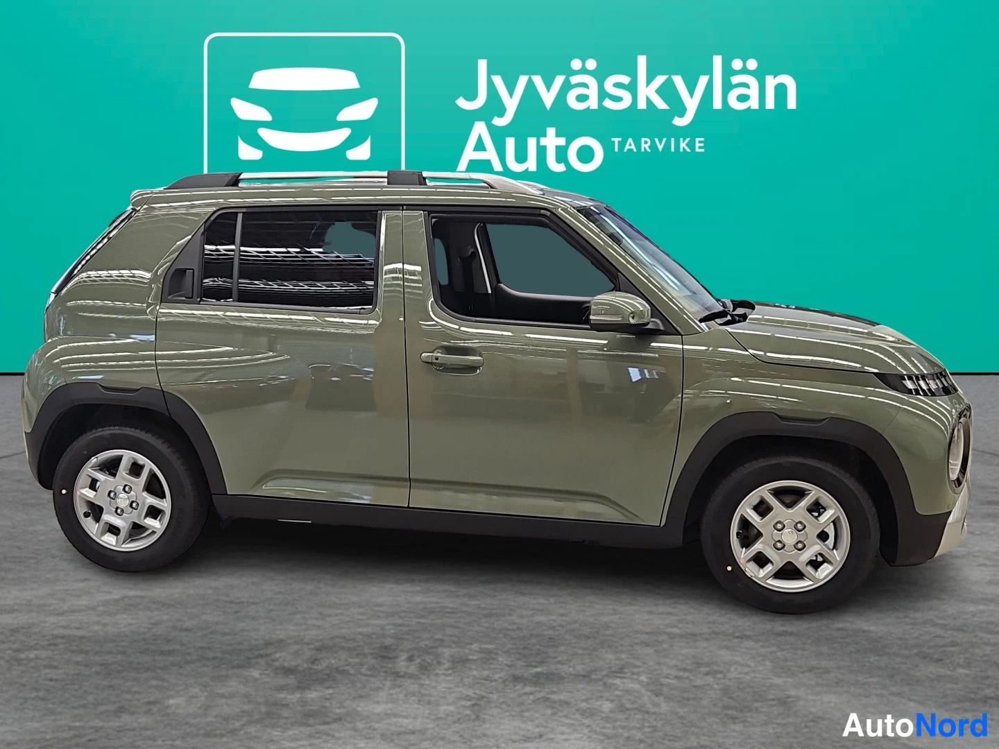 Vihreä Hyundai Inster 2026, etuviisto, keula oikealle, kuva 3