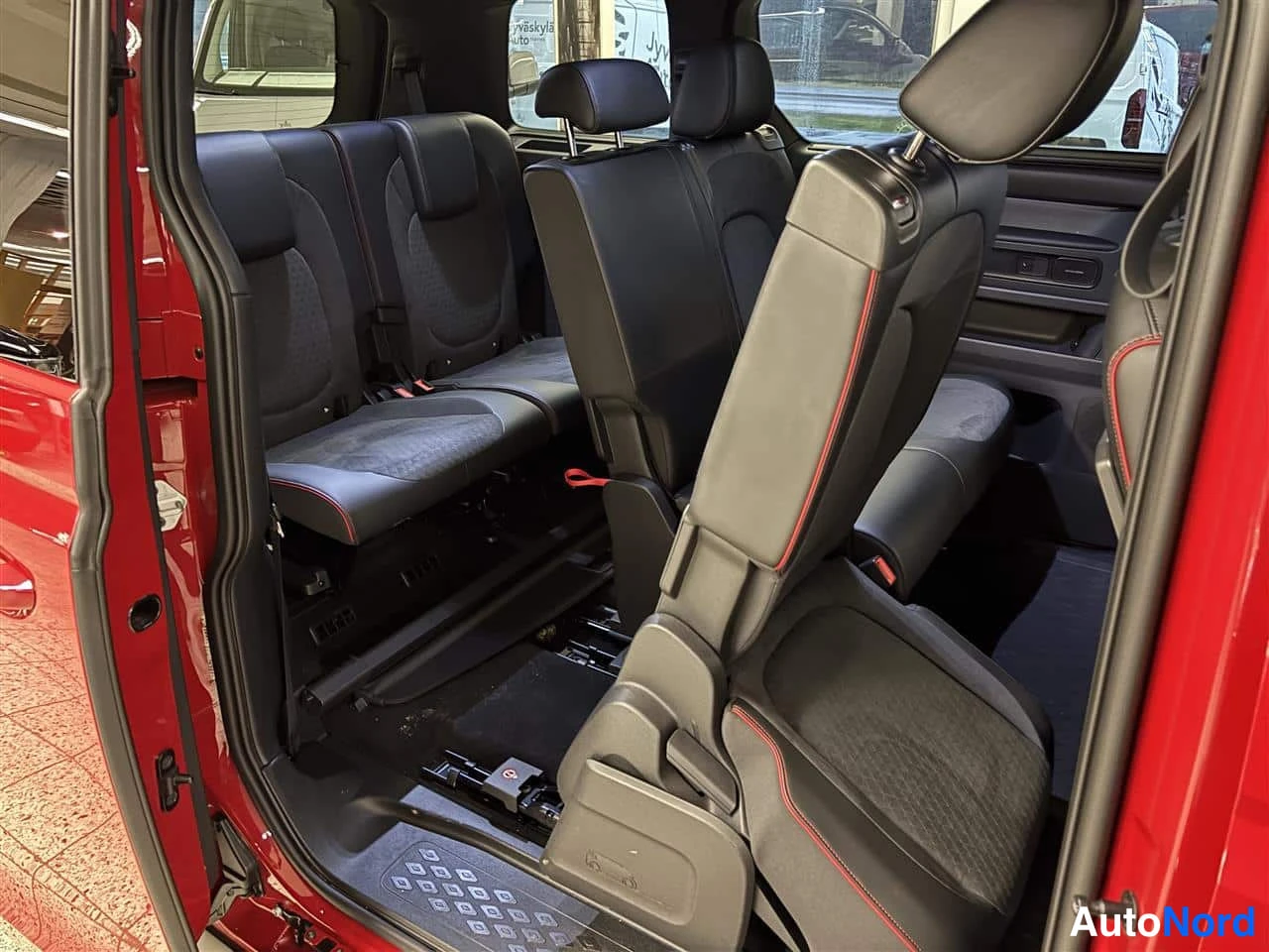 Red Volkswagen ID. Buzz 2025, rear seats, photo 13