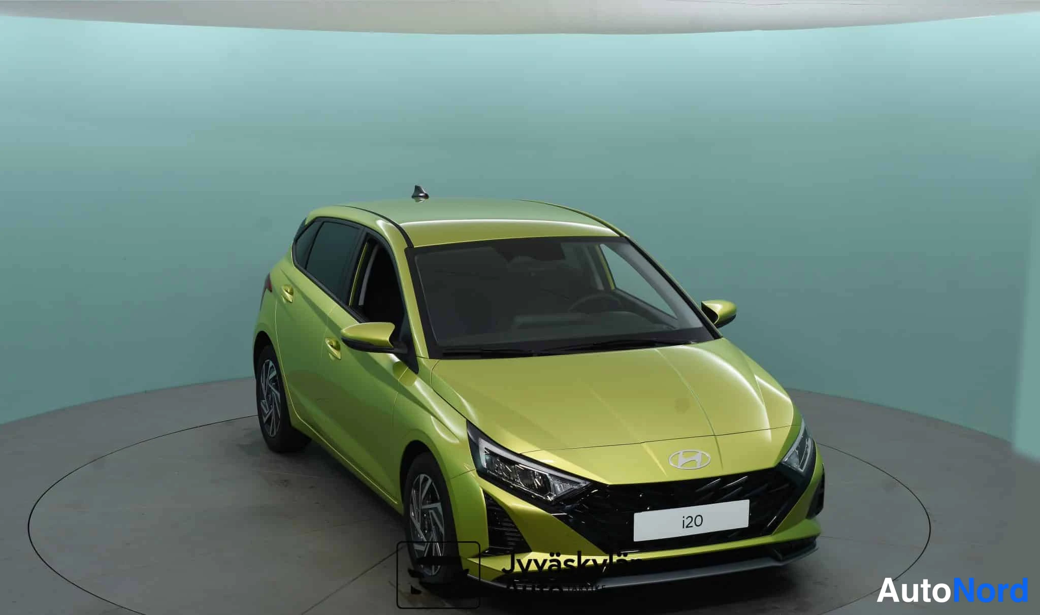 Yellow Hyundai i20 2026, front three-quarter, nose to the right, photo 6