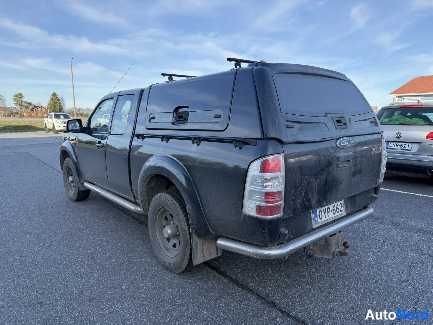 Musta Ford Ranger 2011, takaviisto, kuva 2
