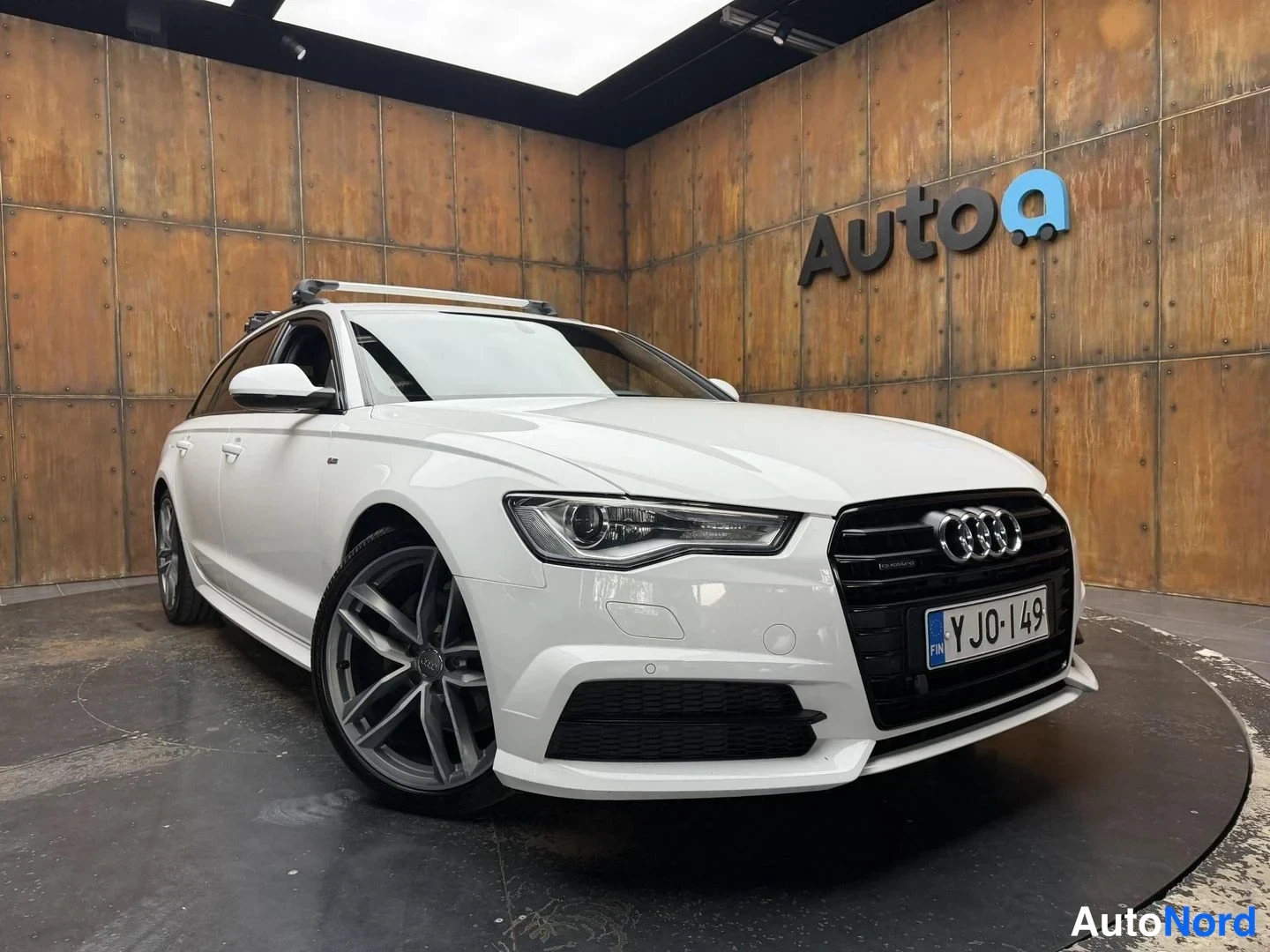 Valkoinen Audi A6 Avant 2016, etuviisto, keula oikealle, kuva 4
