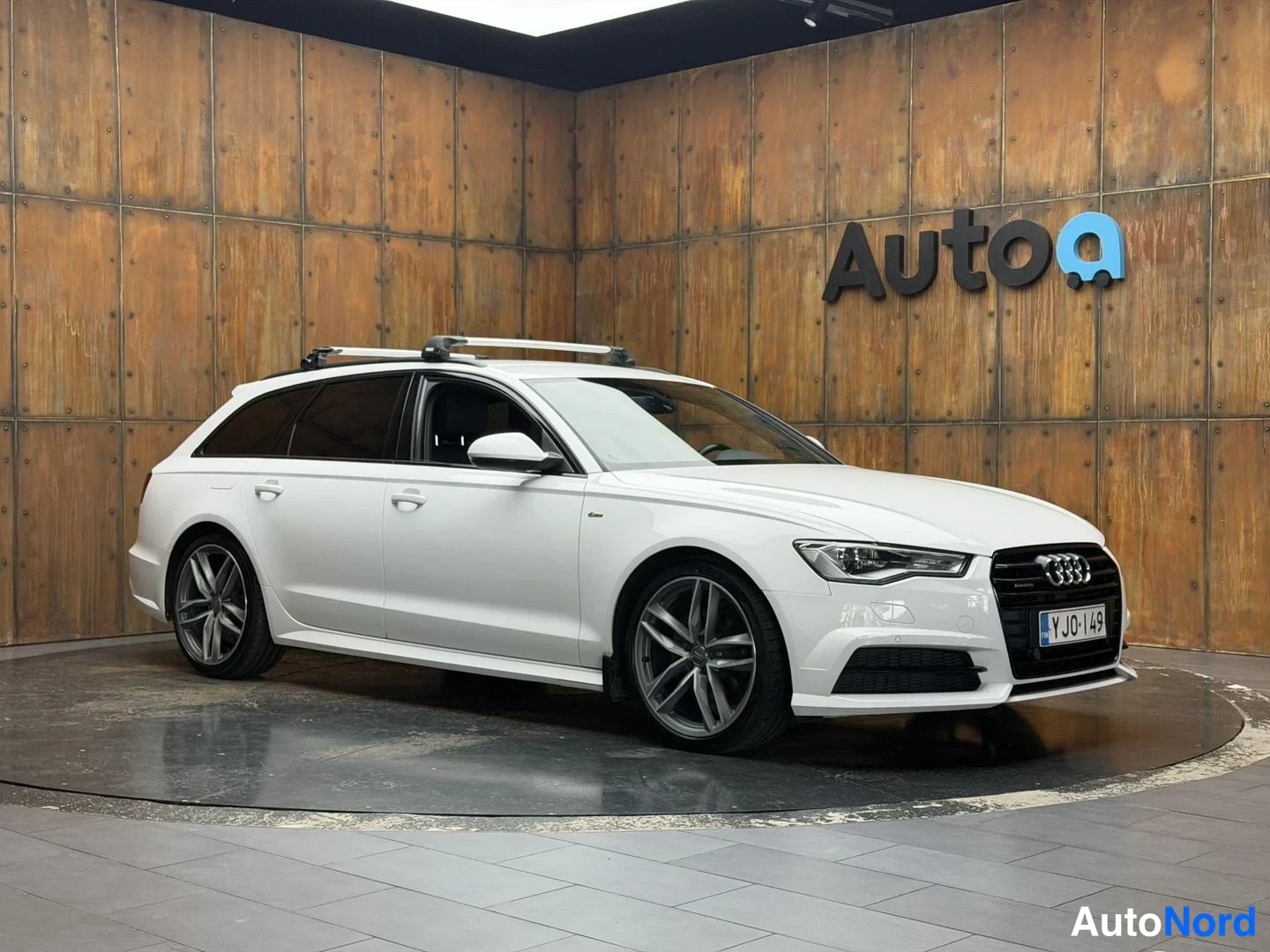 Valkoinen Audi A6 Avant 2016, etuviisto, keula oikealle, kuva 5