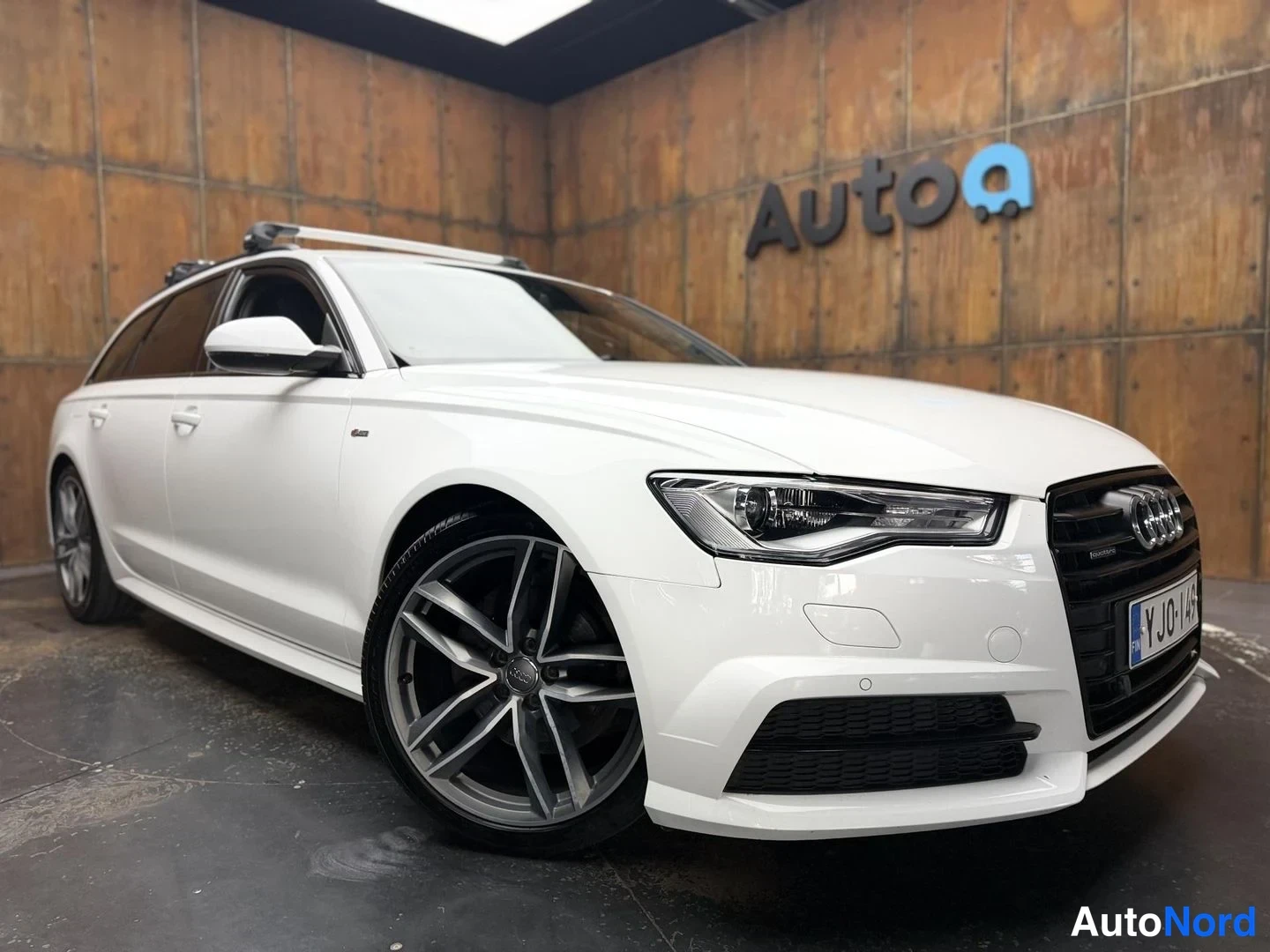 Valkoinen Audi A6 Avant 2016, etuviisto, keula oikealle, kuva 7