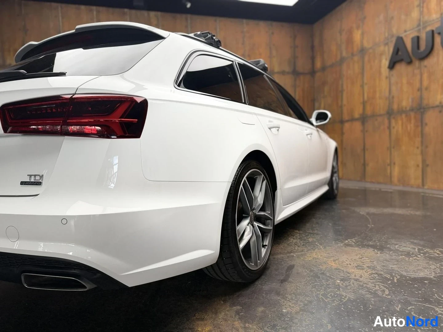 Valkoinen Audi A6 Avant 2016, takaviisto, kuva 13