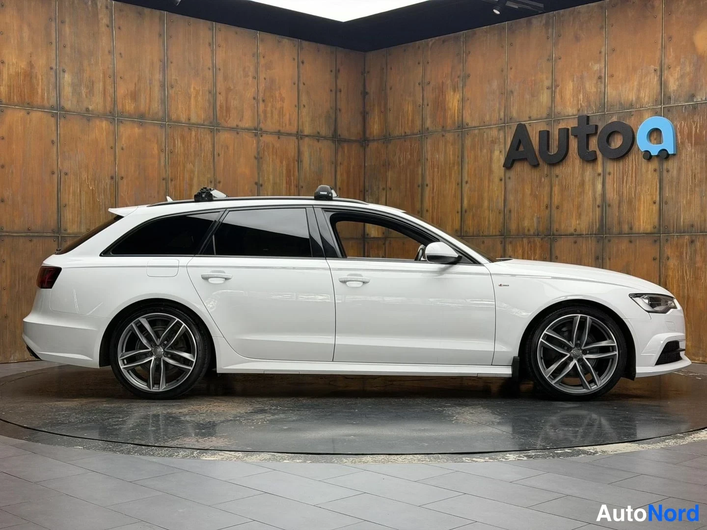 Valkoinen Audi A6 Avant 2016, sivulta, kuva 9