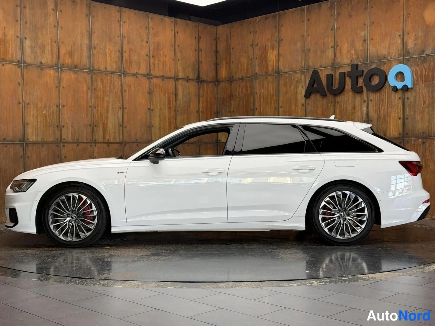 Valkoinen Audi A6 Avant 55 TFSI e 2020, sivulta, kuva 9