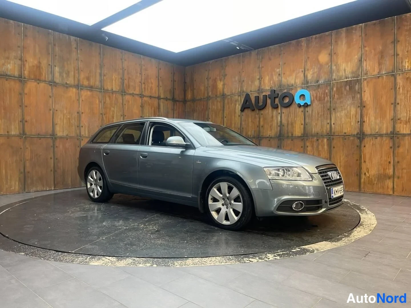 Harmaa Audi A6 2009, sivulta, kuva 7
