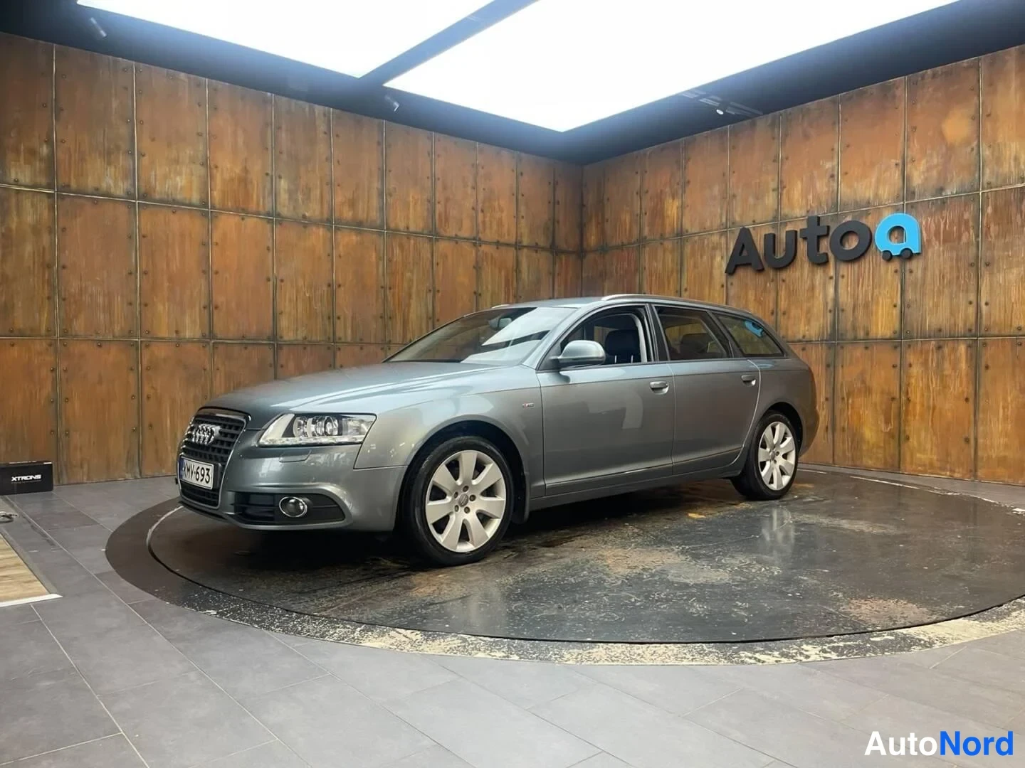 Harmaa Audi A6 2009, etuviisto, keula vasemmalle, kuva 2