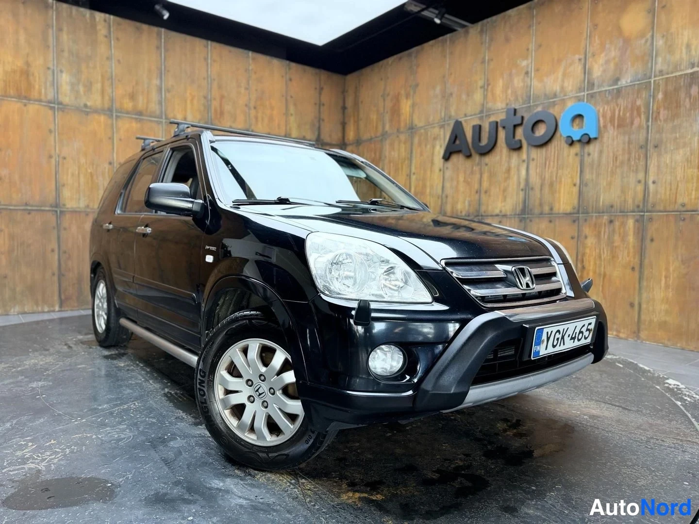 Musta Honda CR-V 2006, etuviisto, keula oikealle, kuva 4