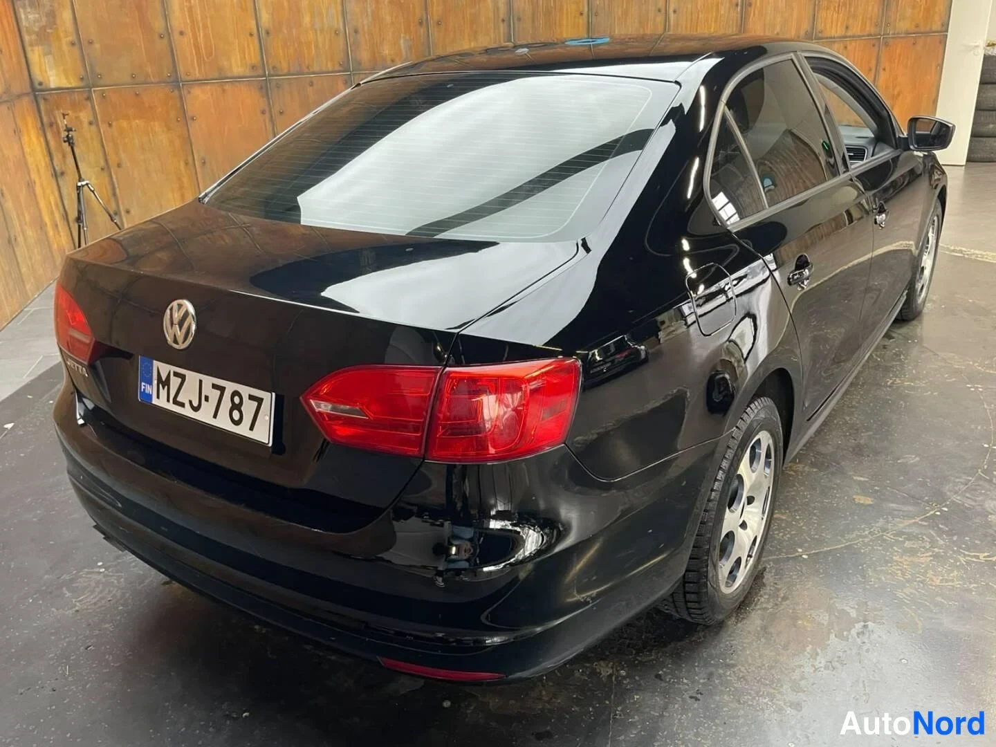 Musta Volkswagen Jetta 2011, takaviisto, kuva 10