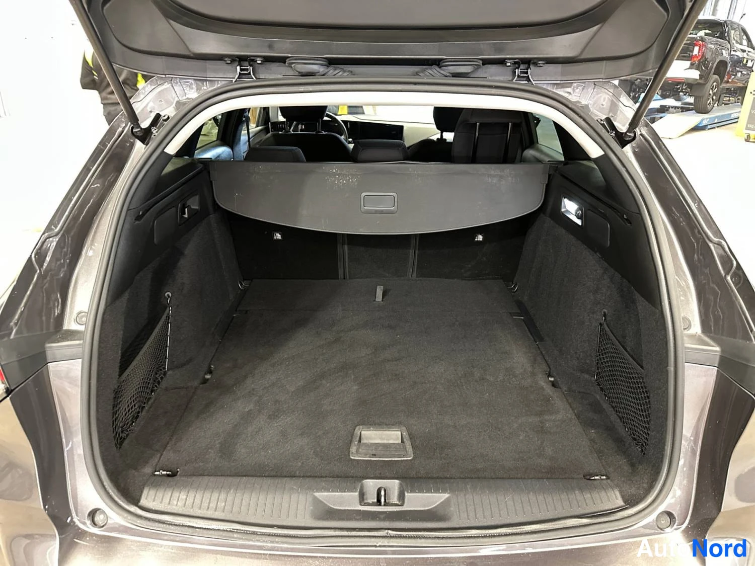 Grey Opel Astra Sports Tourer 2024, boot, photo 16