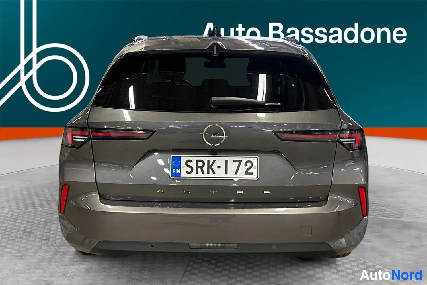 Grey Opel Astra Sports Tourer 2024, rear, photo 8