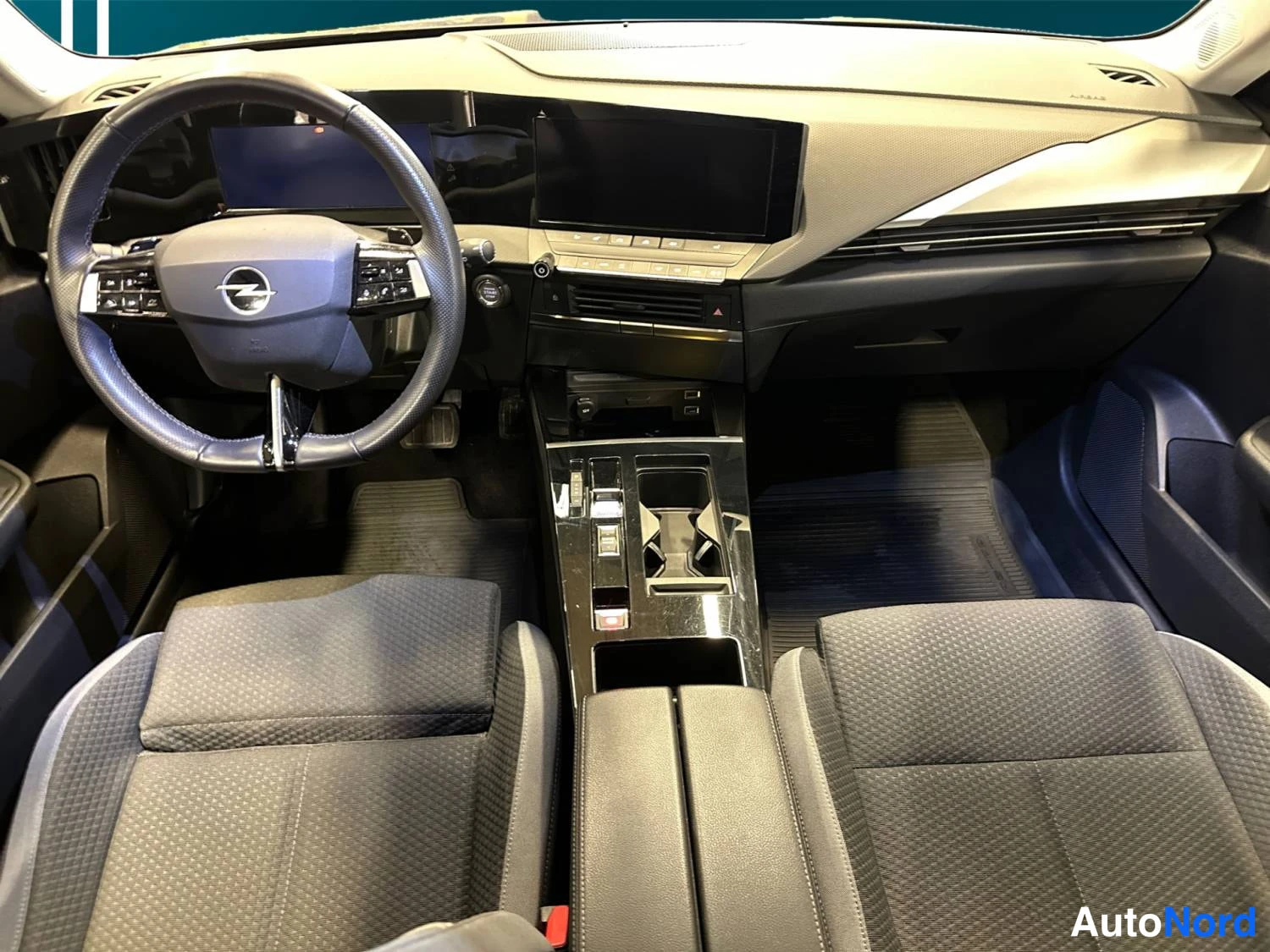 Grey Opel Astra Sports Tourer 2024, cockpit, photo 10