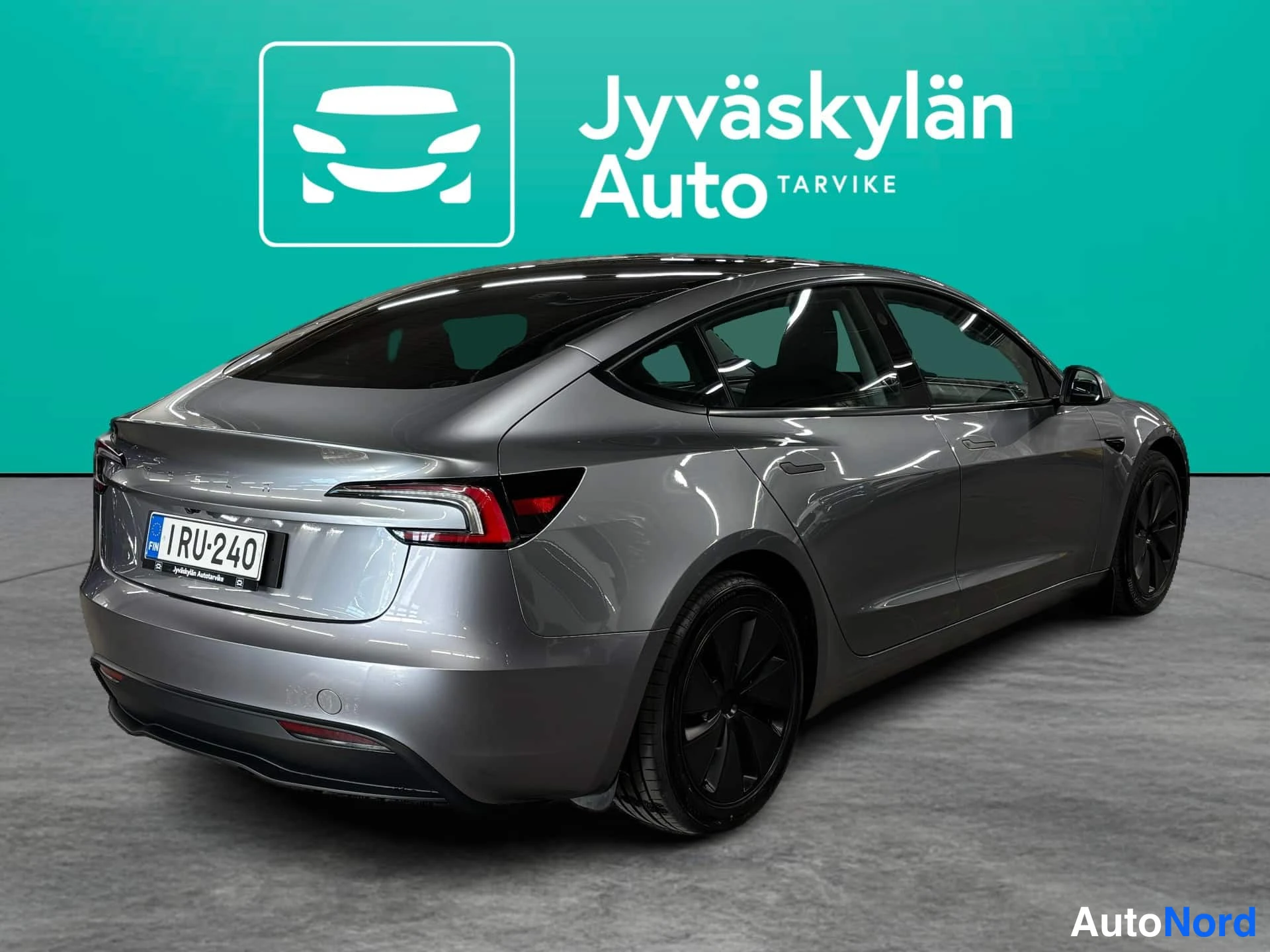 Harmaa Tesla Model 3 2024, takaviisto, kuva 7