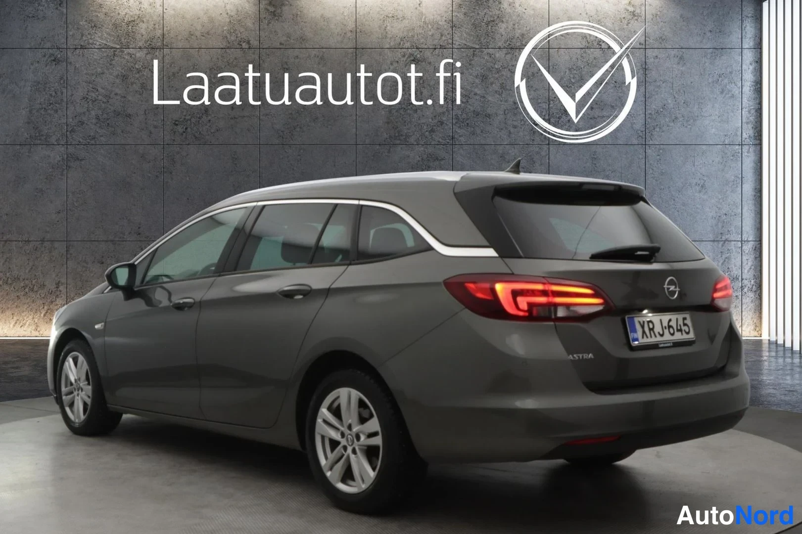 Harmaa Opel Astra Sports Tourer 2022, takaviisto, kuva 5