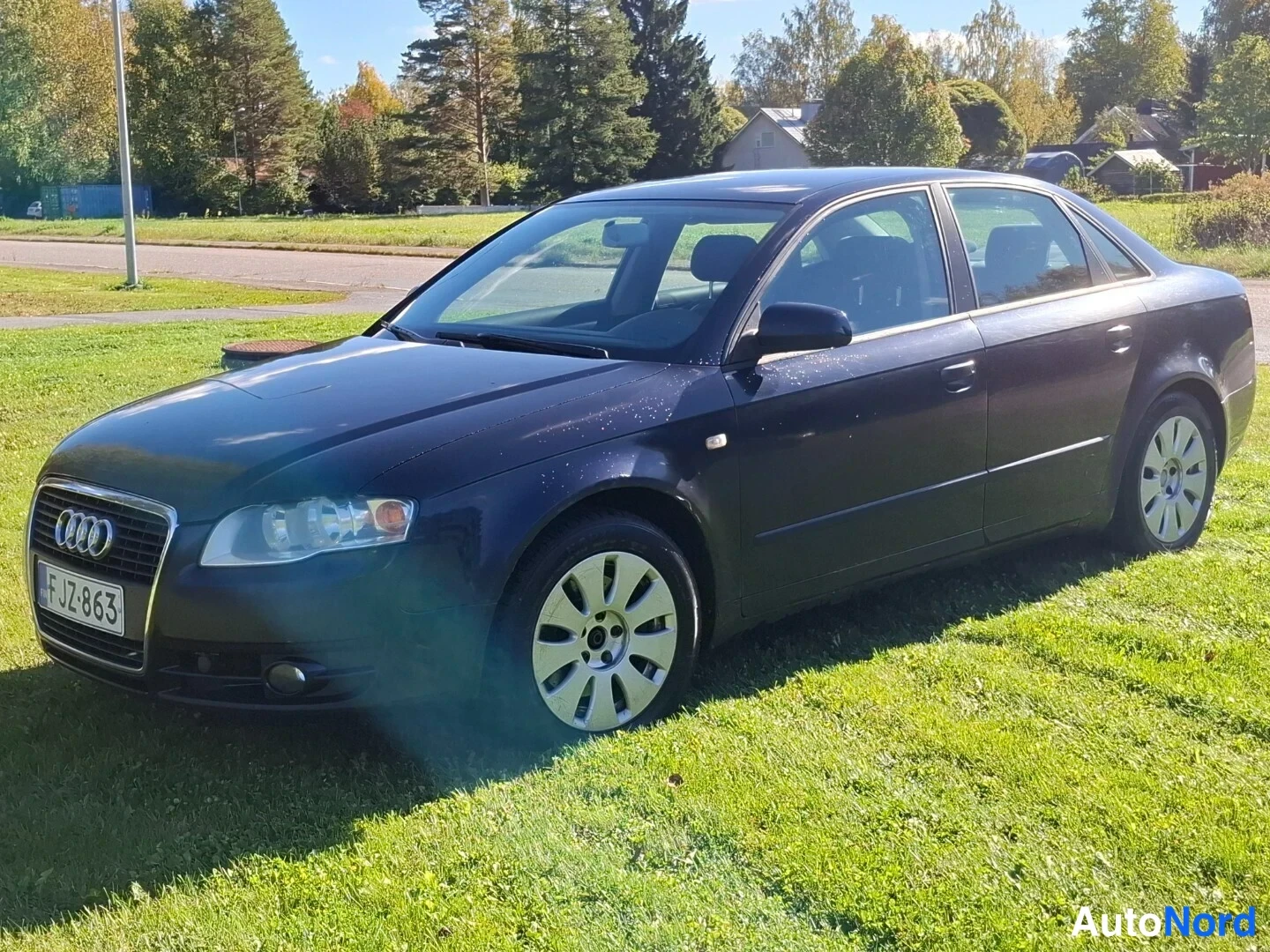 Sininen Audi A4 2006, etuviisto, keula vasemmalle, kuva 2